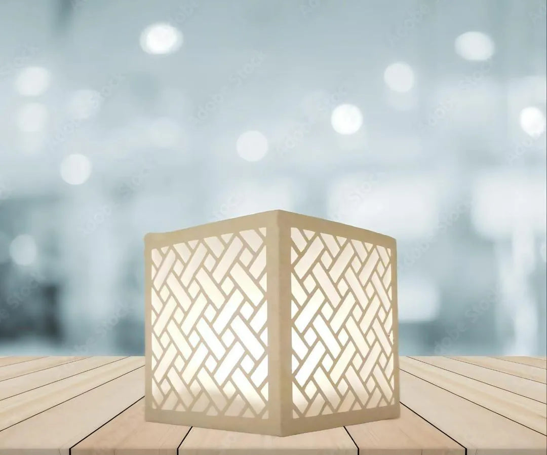 Modern White Geometric Tea Light Lamp with Golden Glow